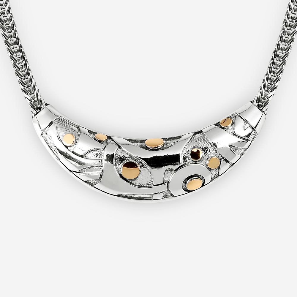 Abstract silver statement necklace with 14k gold dots.