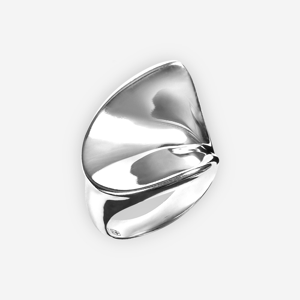 Abstract sterling silver statement ring with an abstract polished upper detail.
