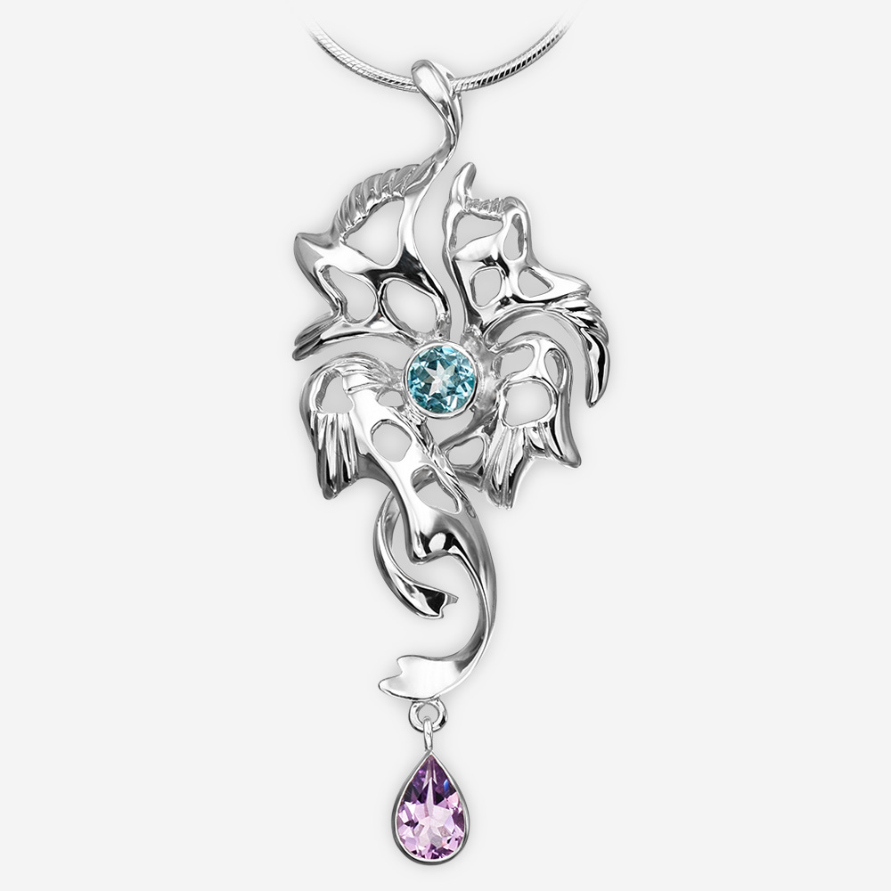 Silver blue topaz and amethyst drop pendant crafted in 925 sterling silver.