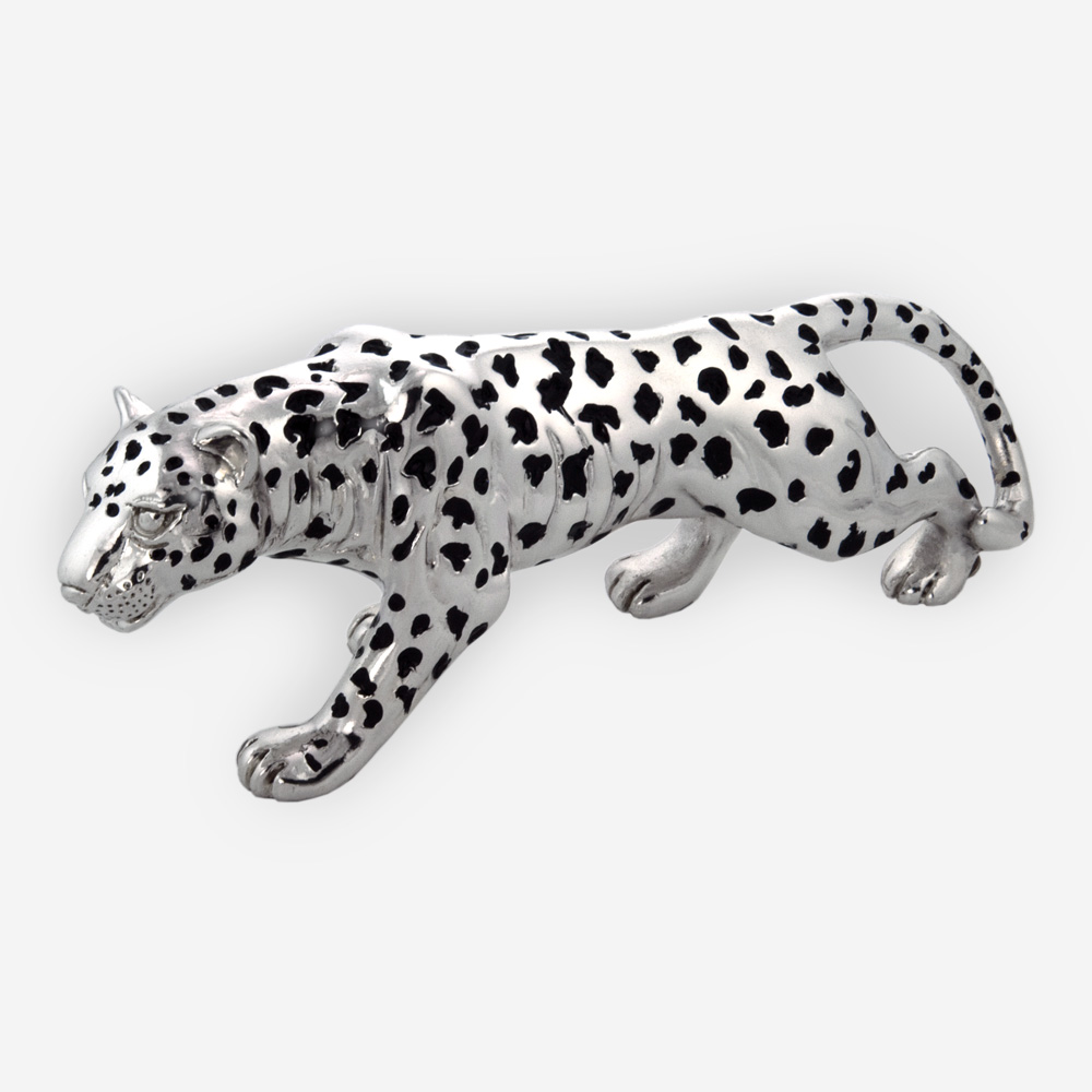 Electroformed silver leopard sculpture with polished finish and oxidized spots.