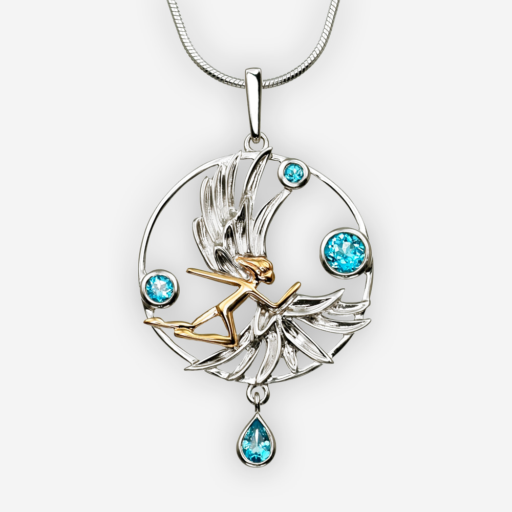 Pendiente de plata del ángel de oro con las gemas azules múltiples del topacio.