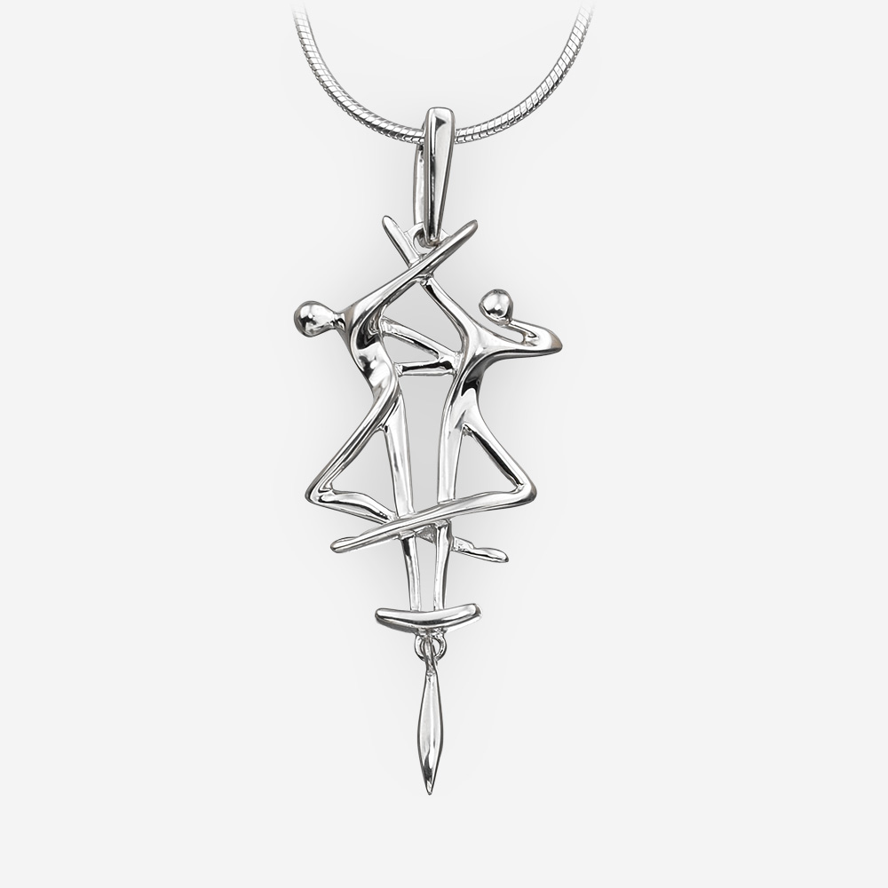 Long silver pendant with dancing couple motif crafted from 925 sterling silver.