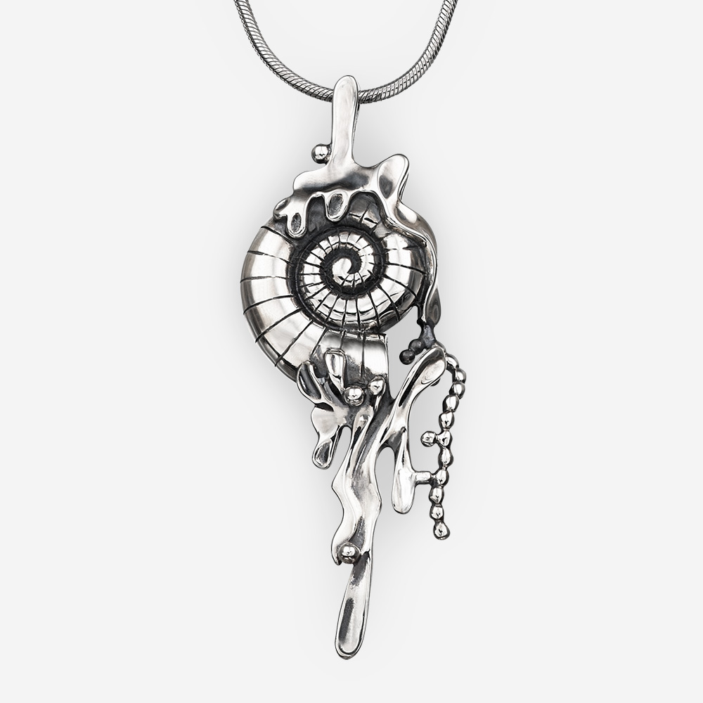 Long sterling silver seashell pendant with an oxidized finish.