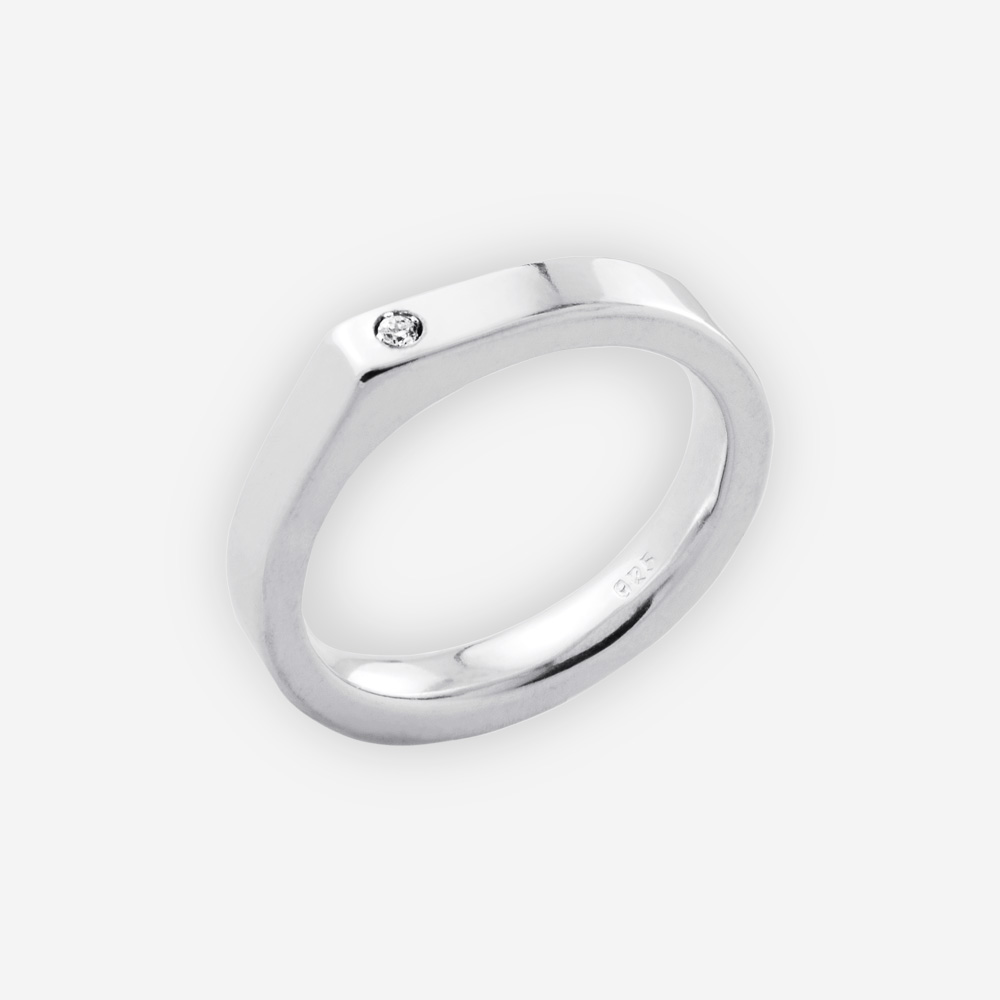 Modern dimensional sterling silver ring features modern angular upper set with a CZ.
