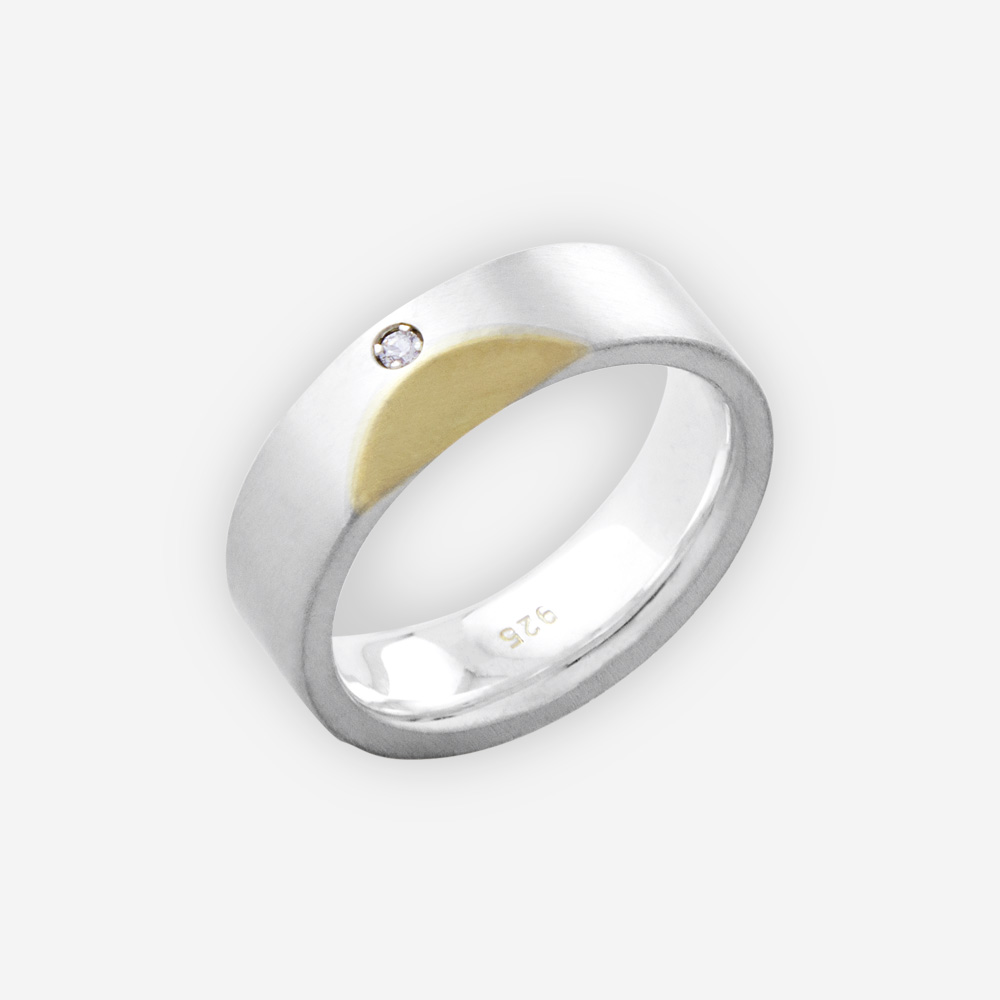 Modern unisex two tone silver band is crafted from 925 sterling silver and 14k gold set with small CZ stone.