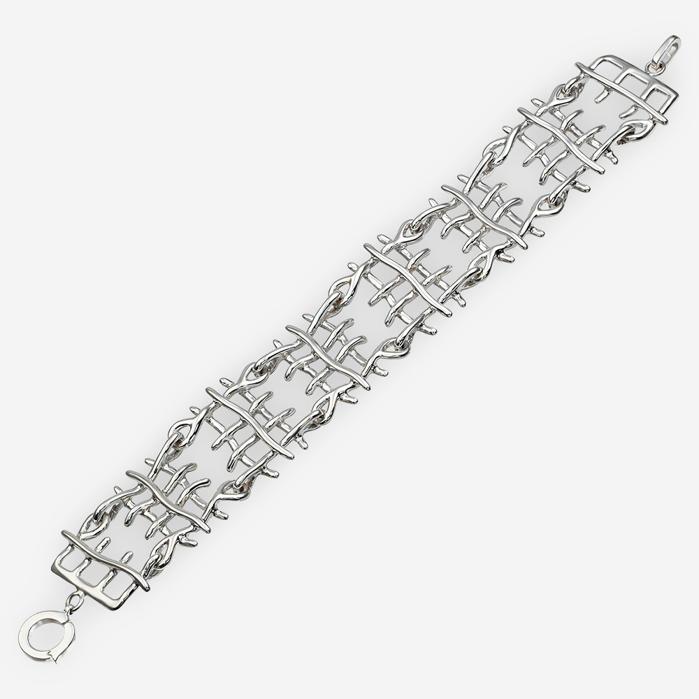 Modern woven silver bracelet with multiple links featuring a woven wicker pattern in 925 sterling silver.