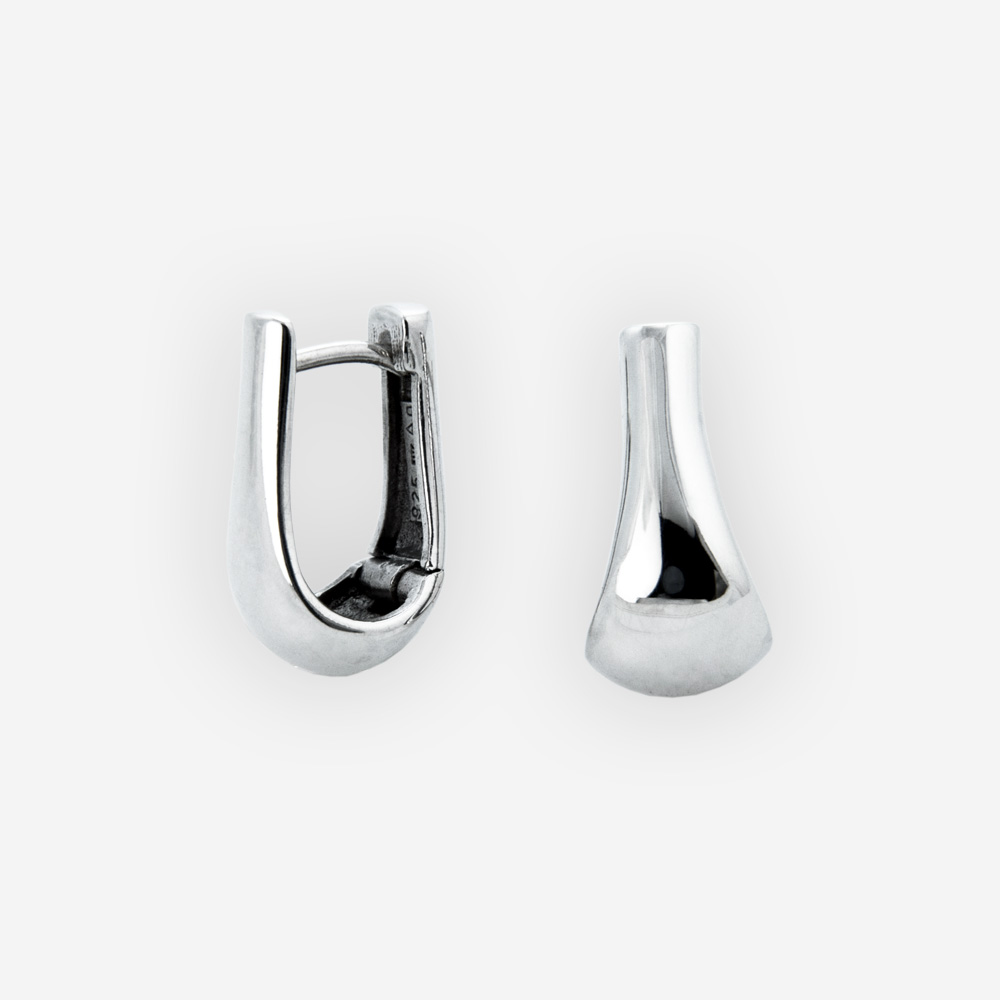 Organic shaped silver hoops are crafted in 925 sterling silver and feature huggie closures
