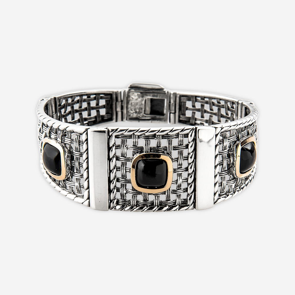 .Silver onyx bracelet with oxidized silver square lattice work links and onyx cabochons set in 14k gold bezels.