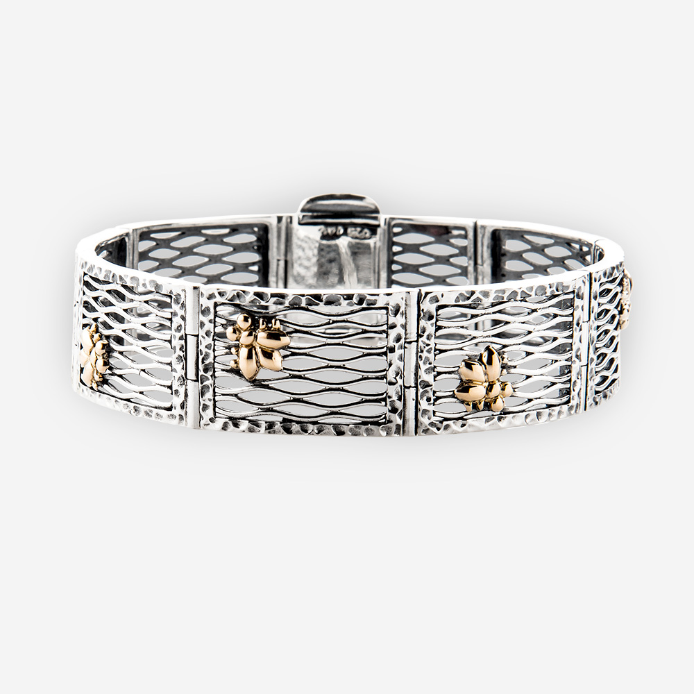 The Silver and Gold Web Bracelet is crafted in sterling silver with cute flies in gold.