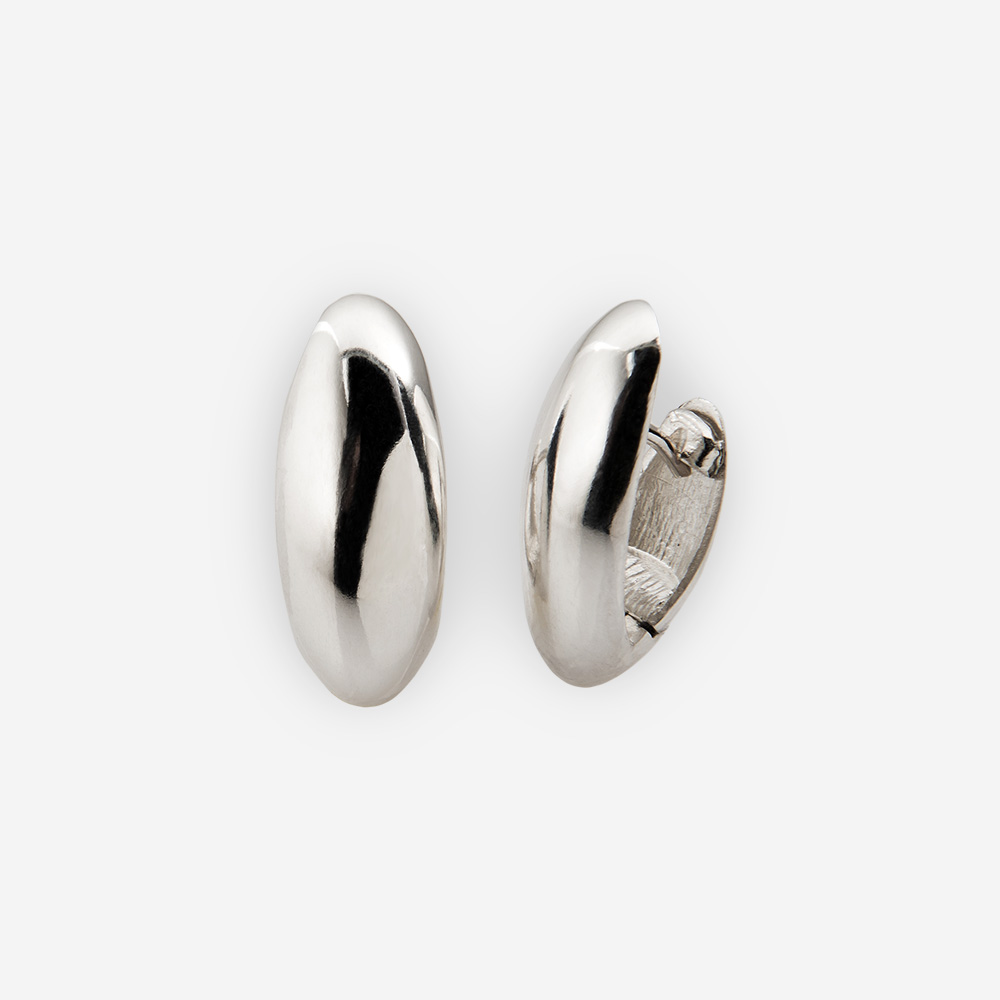 Simple sterling silver hoop earrings with huggie closure.