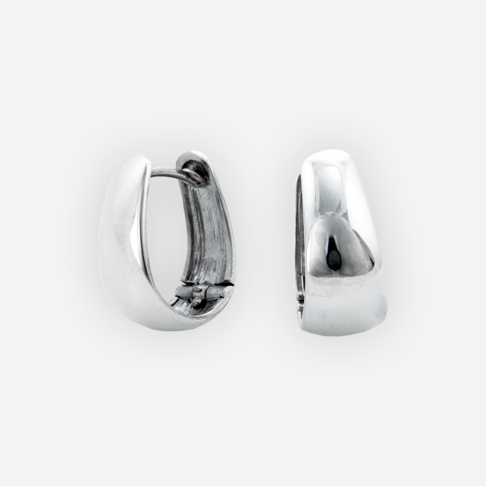 Small oval huggie hoop earrings crafted in polished 925 sterling silver.