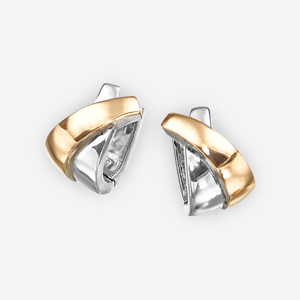 Small two tone crisscross silver hoops crafted in 925 sterling silver and 14k gold.