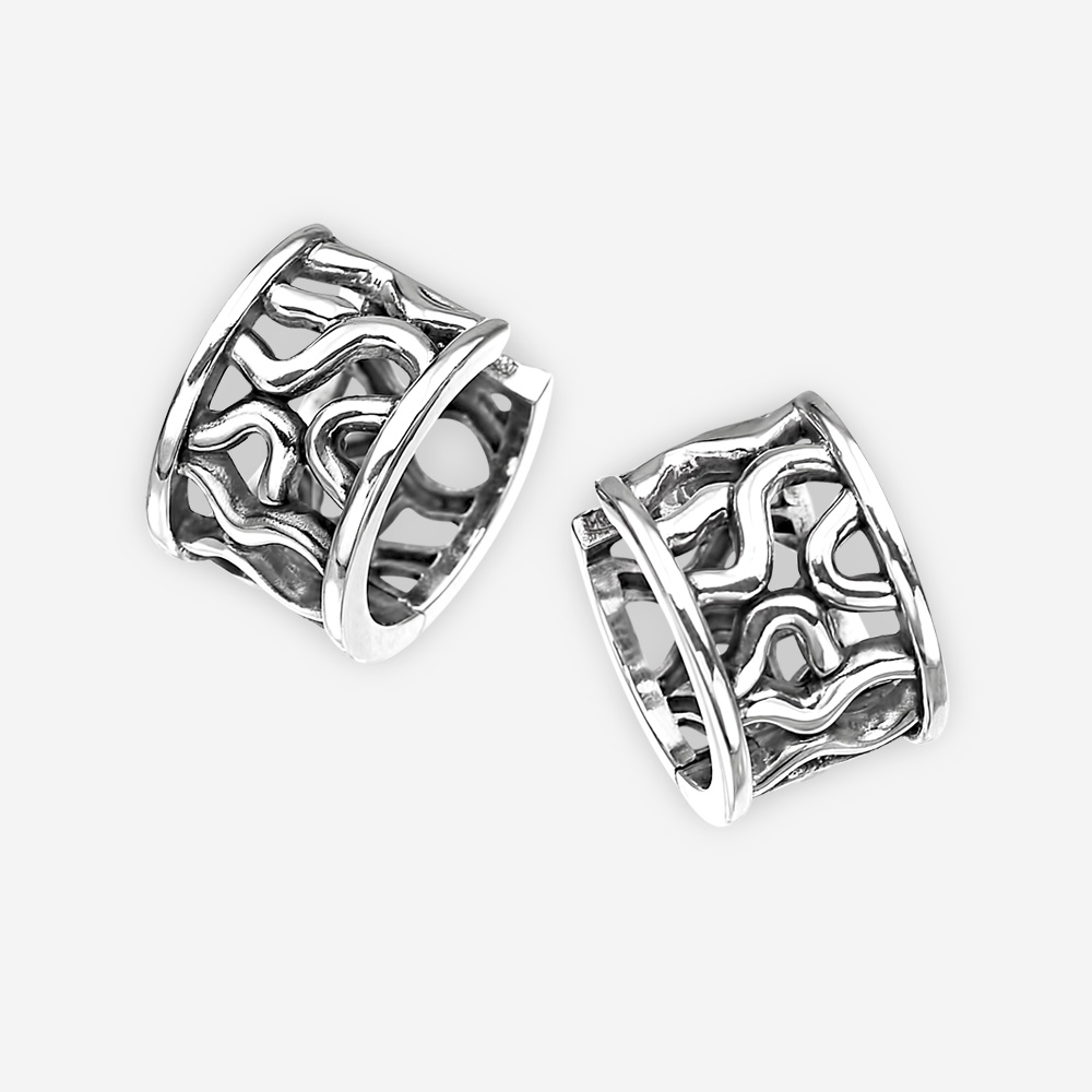 Sterling silver abstract hoop earrings with openwork detailing and huggie closures.