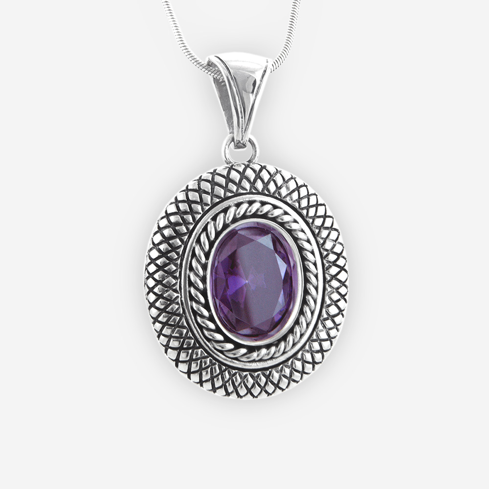 Cookie Pendant Casting in Sterling Silver with Faceted Cubic Zirconia Set. Carved with a Snake Skin Patterns.