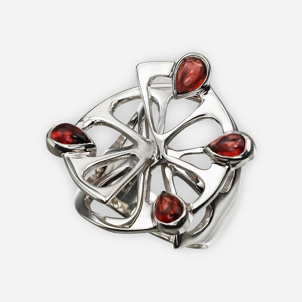 Sterling silver orange ring with a 3D design of a orange segments with four garnet seeds