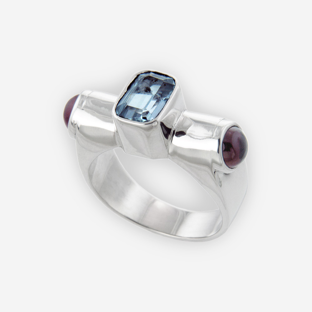 Sculptural Ring Cast in Sterling Silver Setting with Blue Topaz and Amethyst Cabujones.