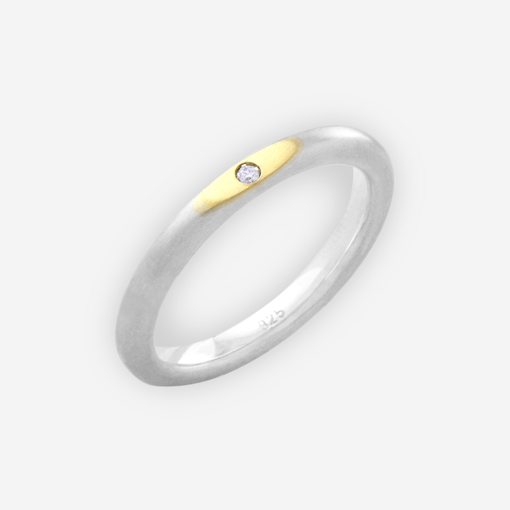 Thin two tone silver unisex ring with 14k gold upper set with CZ stone.