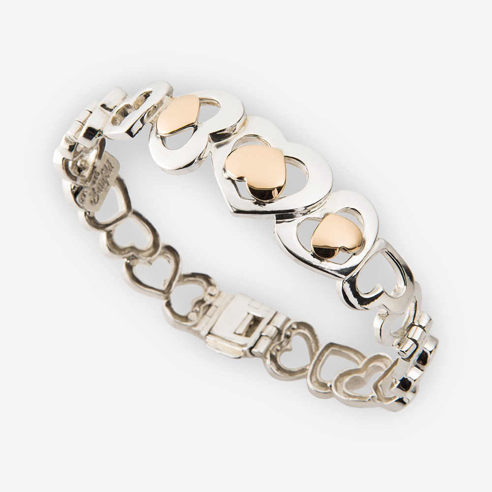 Silver heart bracelet with lovely two-tone multiple heart links.