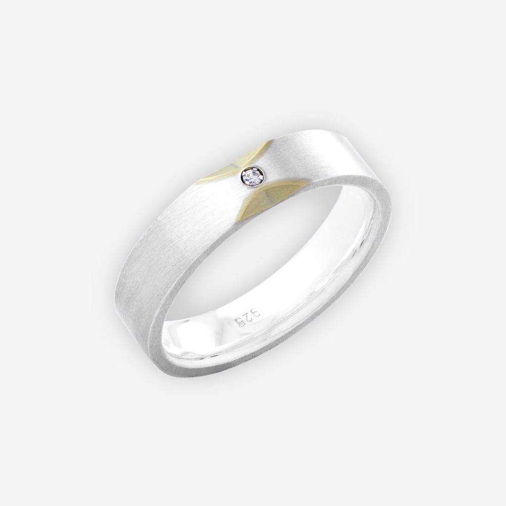 Two tone thick unisex silver band with 14k gold accents and small CZ stone.