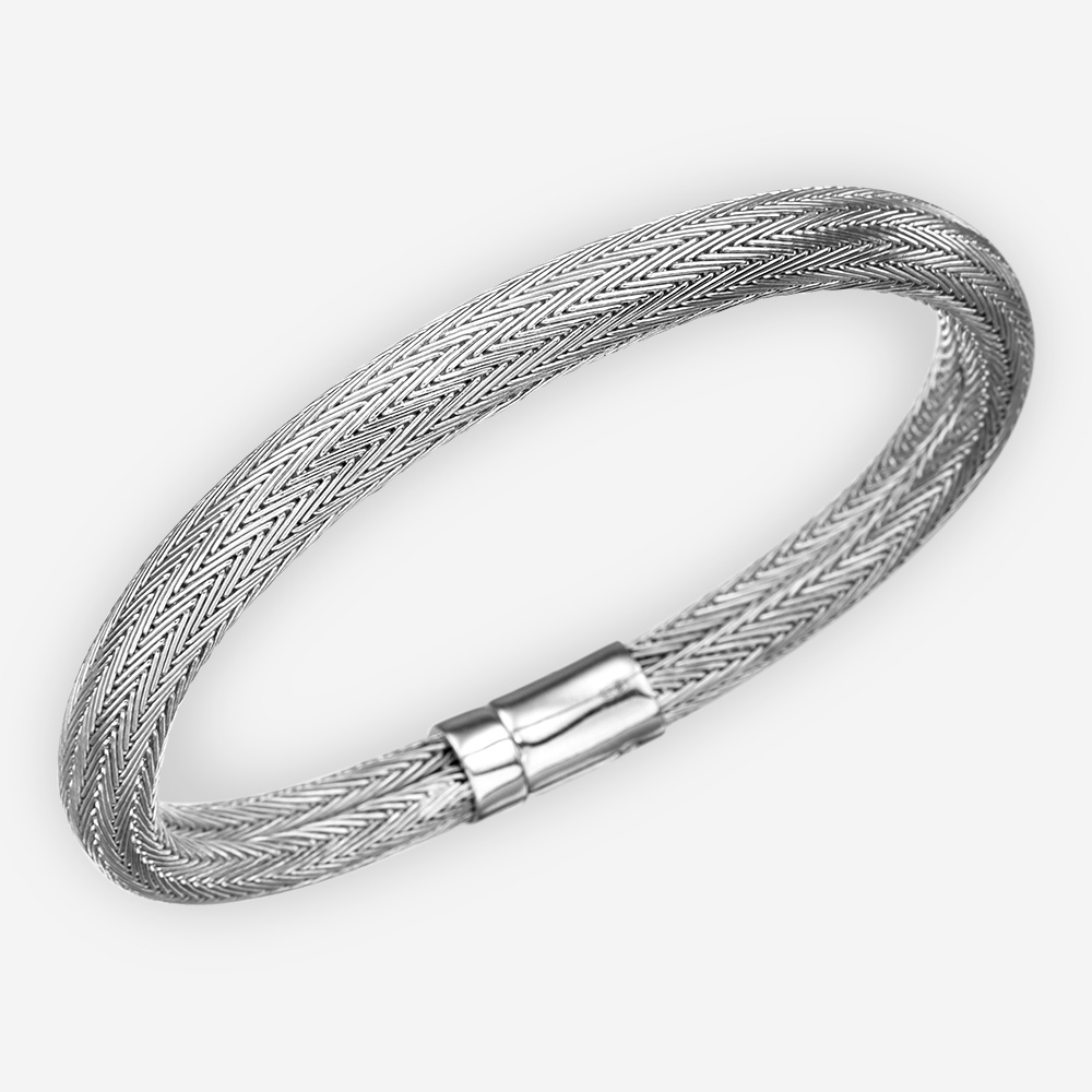 Sterling silver bangle bracelet with a woven herringbone design.